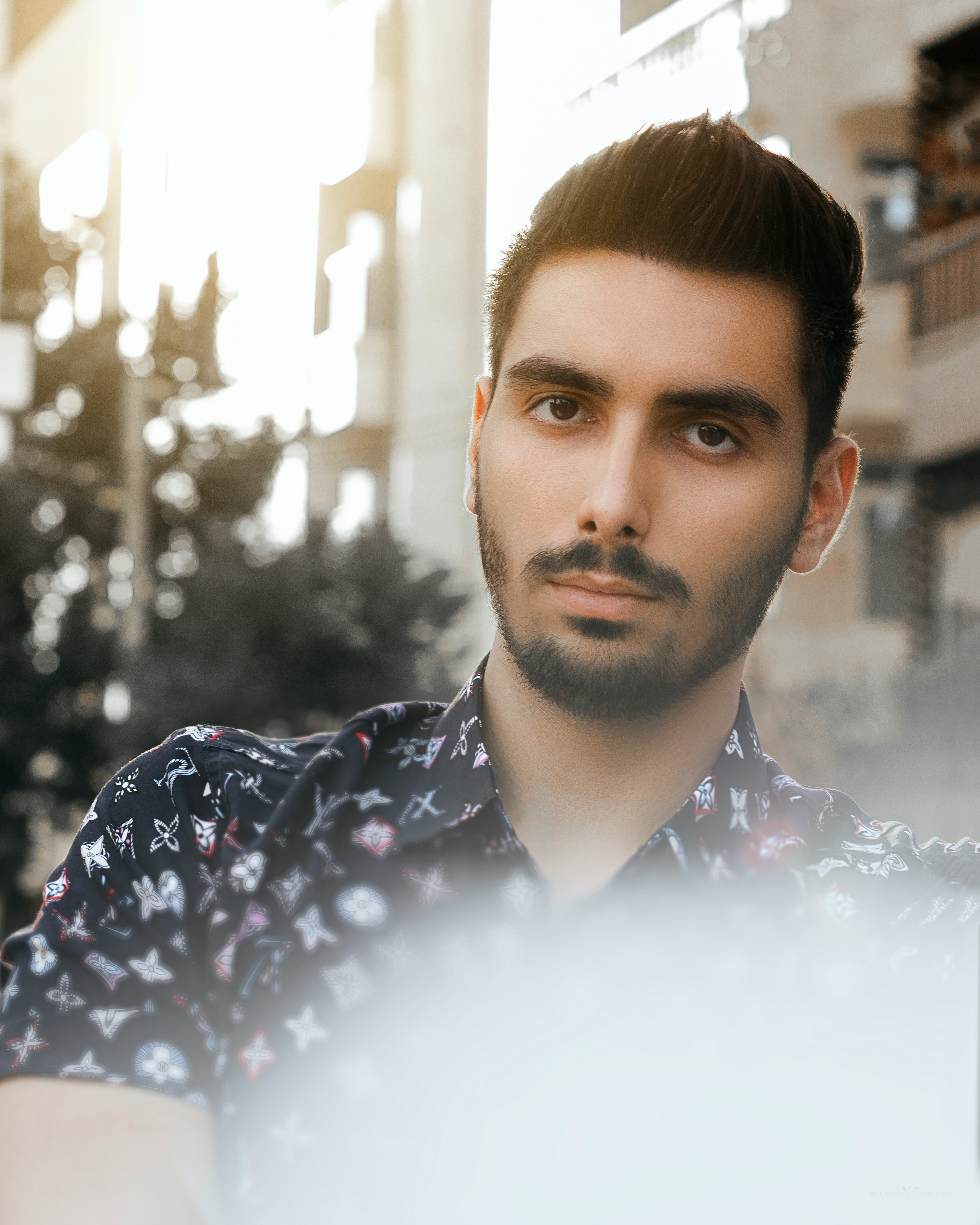 man in black and white button up shirt